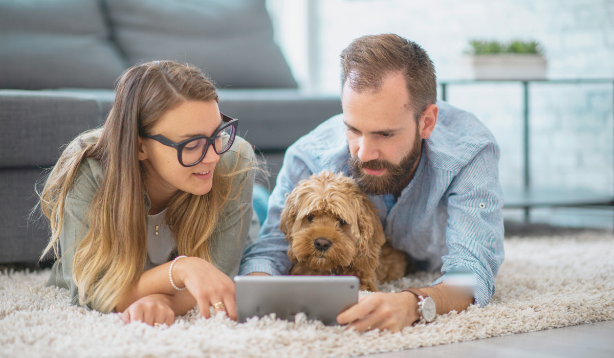Couple with dog planning their financial future